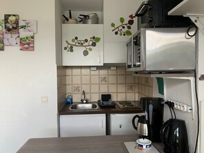 Fridge, microwave, coffee/tea maker, toaster