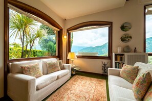 Apartment | Living area | 35-inch TV with digital channels, fireplace - Ca' Furmiga by Wonderful Italy (Tremezzina)