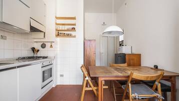 Apartment, Balcony | Private kitchen | Full-size fridge, microwave, oven, stovetop