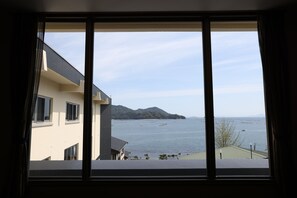 Family Room (16 Tatami-mats), Non Smoking, Sea View | In-room safe, blackout drapes, free WiFi, bed sheets - Miyahama Grand Hotel (Hatsukaichi)