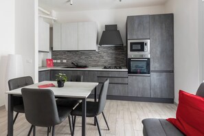 Apartment | Private kitchen | Electric kettle, highchair, dining tables - Modern apartment in Bologna  (Bologna)