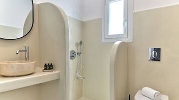 Shower, towels, soap, shampoo
