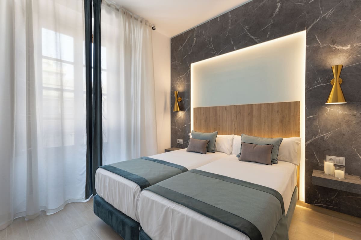 Standaard appartement, 1 slaapkamer | 1 slaapkamer, donsdekens, verduisterende gordijnen