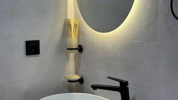 Hair dryer, towels, soap, shampoo