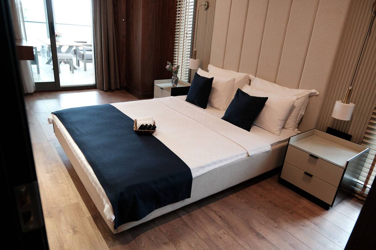 Luxury Suite, Terrace, Pool View | Minibar, iron/ironing board (on request), WiFi (free), bed sheets