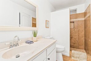 Hair dryer, towels, soap, shampoo