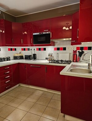 Apartment | Private kitchen | Fridge, microwave, oven, stovetop