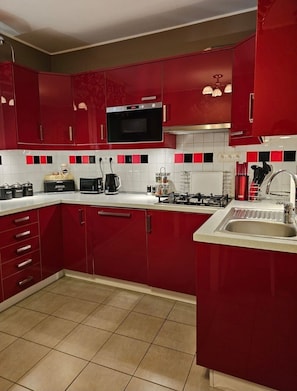Apartment | Private kitchen | Fridge, microwave, oven, stovetop