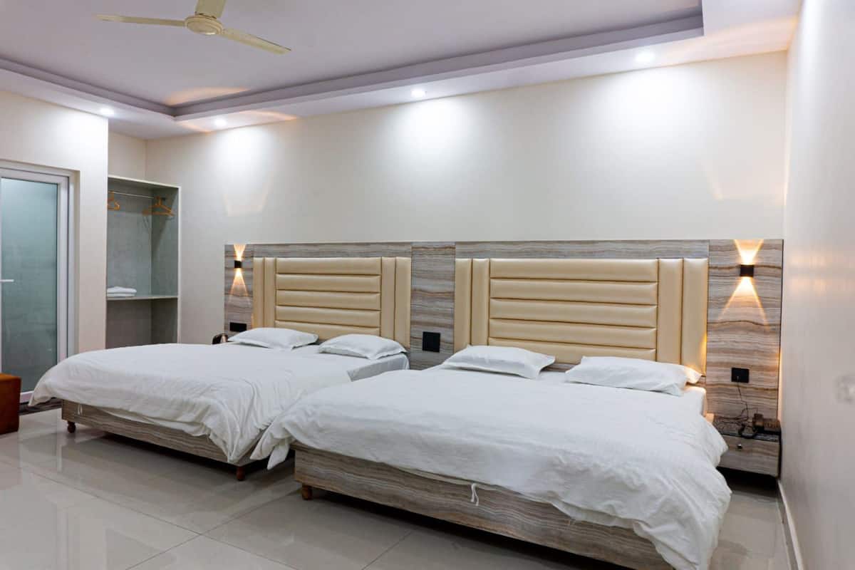 Desk, laptop workspace, free WiFi, bed sheets