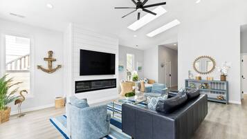 Smart TV, fireplace, books