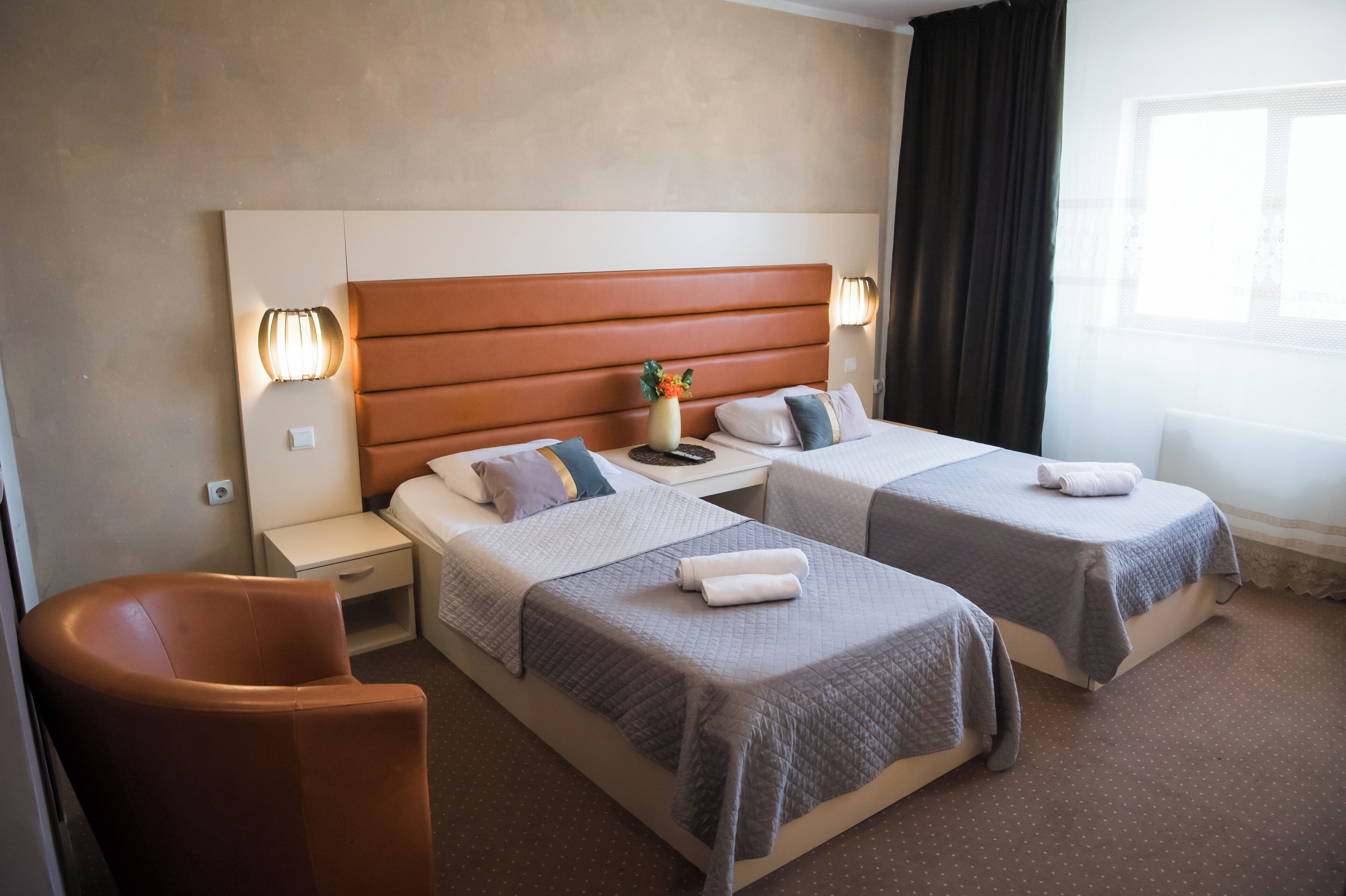 Premium bedding, memory foam beds, laptop workspace, free WiFi