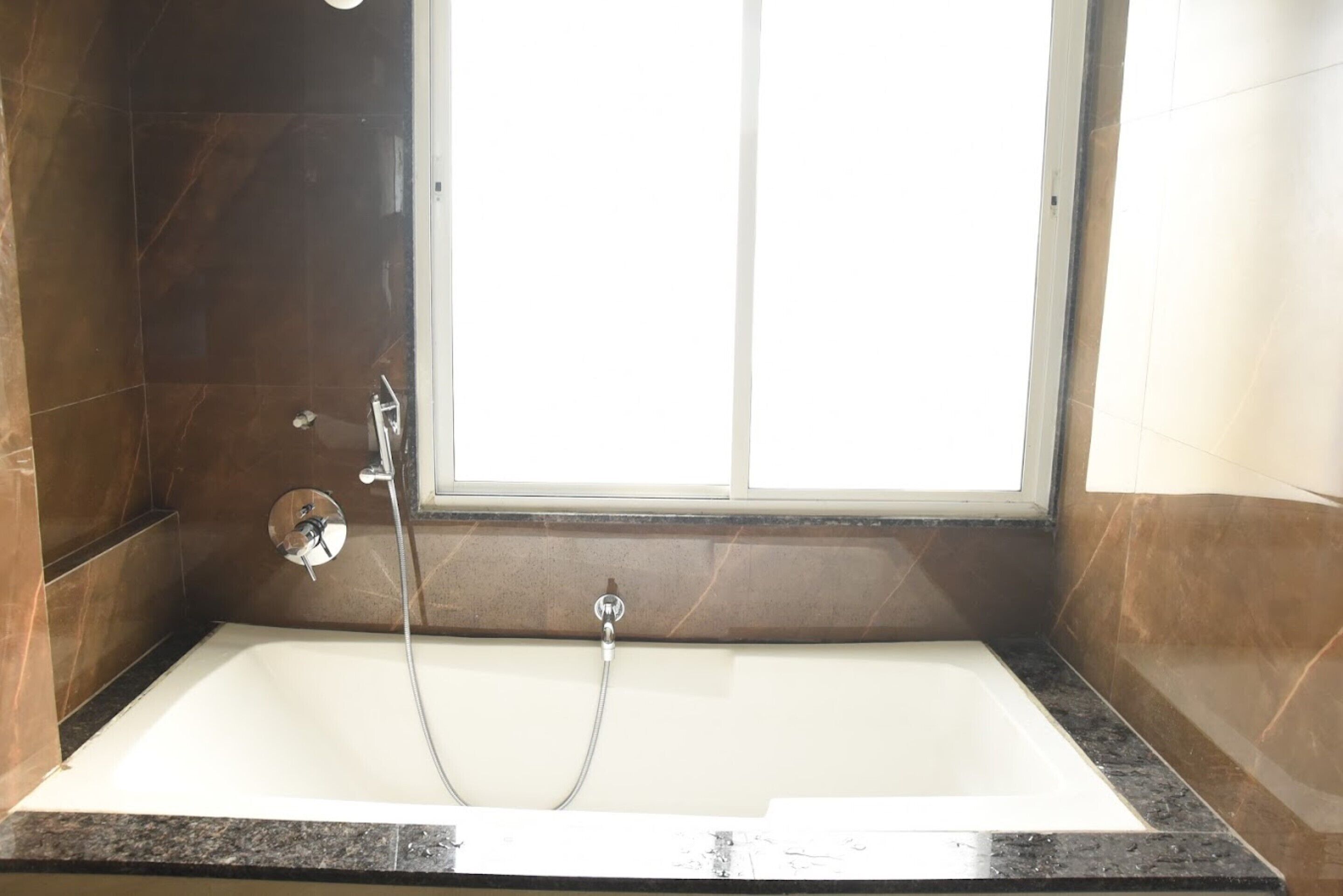 Shower, rainfall showerhead, soap, shampoo