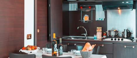 Fridge, microwave, high chair, cookware/dishes/utensils