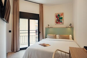 Desk, laptop workspace, free WiFi, bed sheets