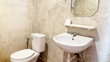 Shower, towels, toilet paper