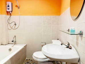 Ducha, toallas y papel higiénico