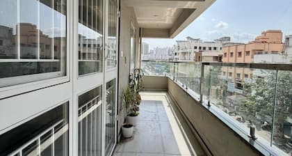 Owl's Retreat: 2BHK Modern AC Flat in Wakad, Pune