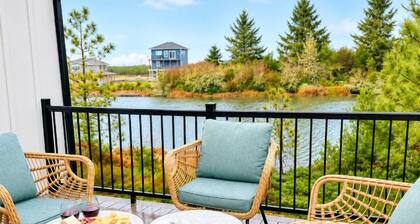 After Dune Delight is a newly built waterfront escape with peaceful canal views—designed for slow mornings, cozy evenings, and effortless coastal living.