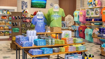 A retail store with various merchandise including t-shirts, hats, and accessories.