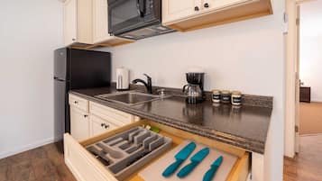 Fridge, microwave, coffee/tea maker, toaster