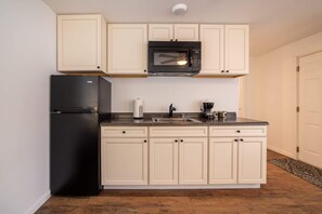 Fridge, microwave, coffee/tea maker, toaster