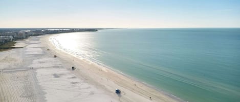 Miles of Beach to Explore - The wet sand along the shoreline is perfect for walking! Packed down just right for your morning exercise.
