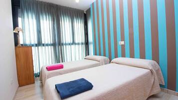 2 dormitorios, tabla de planchar con plancha, wifi y ropa de cama