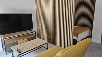 Superior-Loft | Wohnbereich | Fernseher
