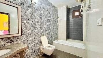 Shower, hydromassage showerhead, bidet, towels