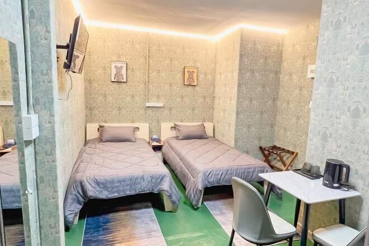 Blackout drapes, WiFi (free), bed sheets