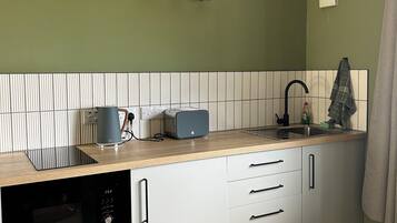 Fridge, microwave, electric kettle, toaster
