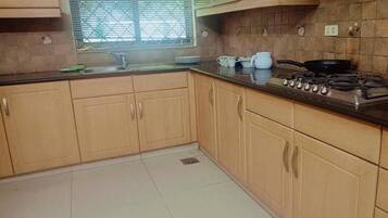 Apartment | Private kitchen | Fridge, microwave, stovetop, electric kettle