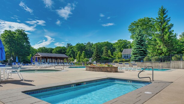 A swimming pool with lounge chairs and a gazebo. - 2 Mi to Moody Beach, Amenity Access: Wells Getaway (Wells)