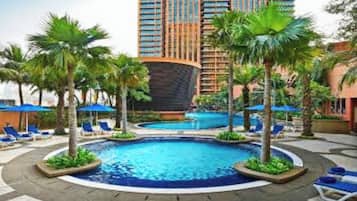 Indoor pool, open 7:00 AM to 8:00 PM, pool umbrellas, pool loungers