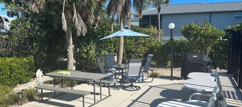 Beautiful waterfront condo with a boat dock, pool, and across from the beach
