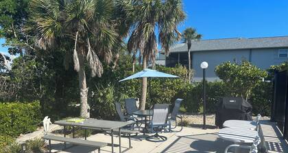 Beautiful waterfront condo with a boat dock, pool, and across from the beach