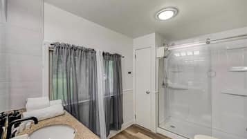 Hair dryer, towels, soap, shampoo