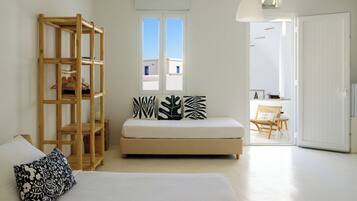 Deluxe Suite, Balcony, Partial Sea View | 1 bedroom, in-room safe, soundproofing, travel cot