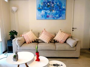 Basic Apartment | Living area | 55-inch Smart TV with digital channels