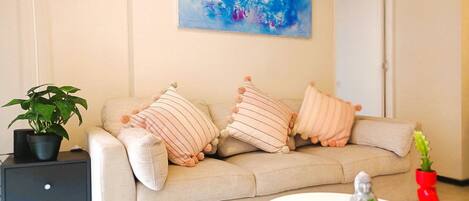 Basic Apartment | Living area | 55-inch Smart TV with digital channels