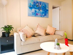 Basic Apartment | Living area | 55-inch Smart TV with digital channels