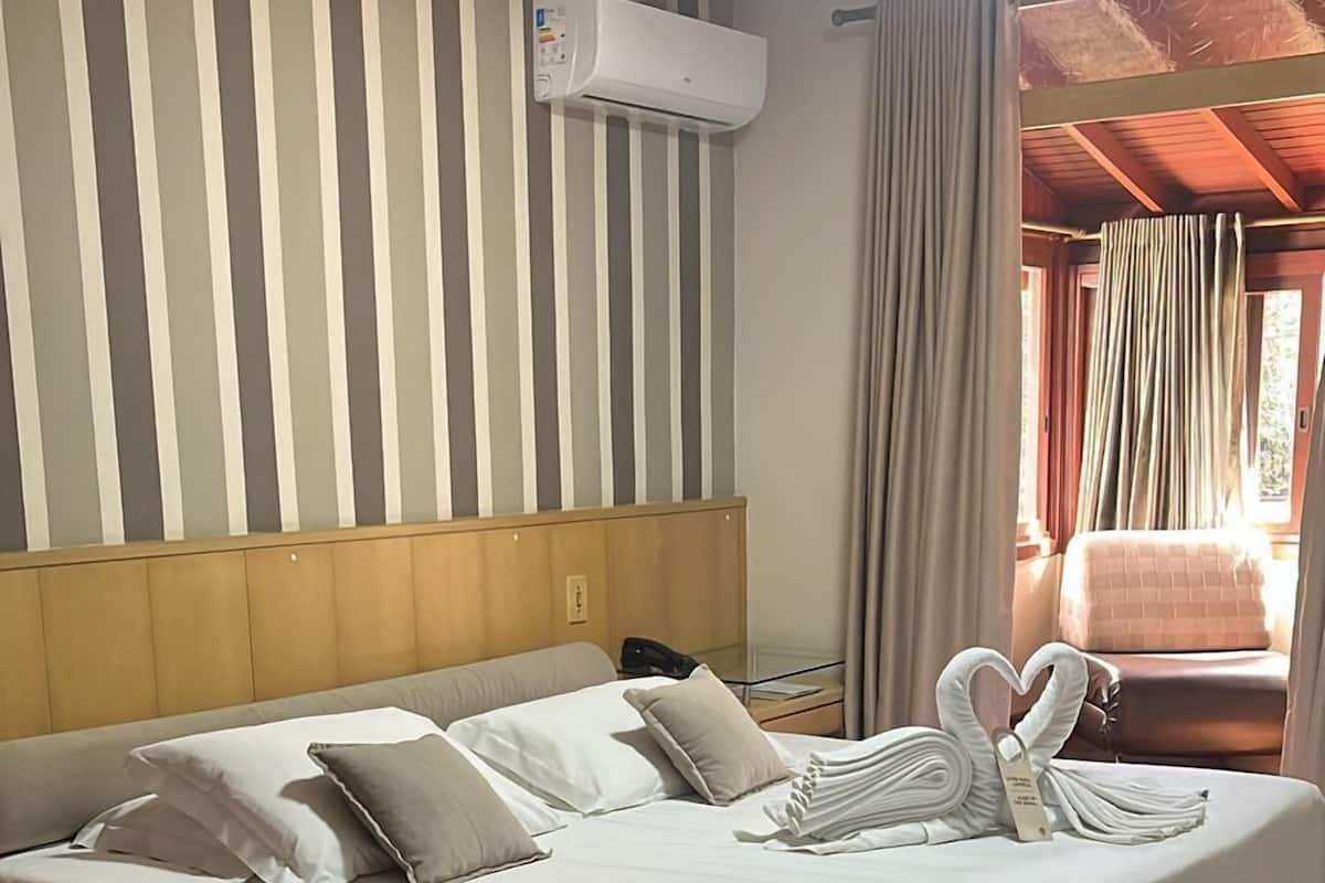 Suite luna di miele, vista giardino | Wi-Fi gratuito, lenzuola