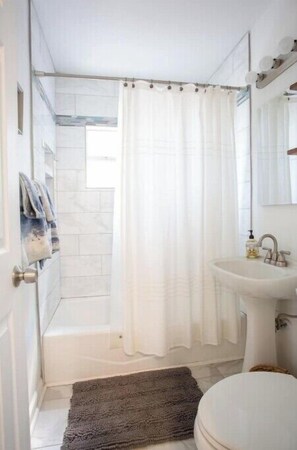 Hair dryer, towels, soap, toilet paper