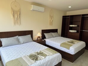 Family Apartment, 2 Bedrooms, City View | 2 bedrooms, in-room safe, blackout curtains, iron/ironing board - Nabani Condominios T1 (Santa María Huatulco)