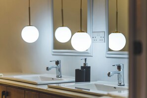 Superior Studio Suite, Garden View | Bathroom | Separate tub and shower, rainfall showerhead, towels, toilet paper