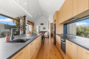 Fridge, stovetop, coffee/tea maker, electric kettle