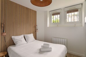 2 slaapkamers, een strijkplank/strijkijzer, gratis wifi, beddengoed