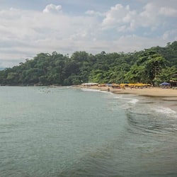 On the beach, beach cabanas, sun-loungers, beach umbrellas