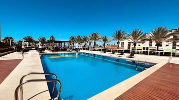 Deluxe Apartment, 1 Bedroom | Pool | Outdoor pool, a heated pool