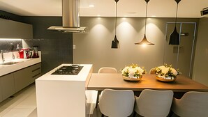 Family Apartment, 1 Bedroom | Private kitchen | Coffee/tea maker, fridge, microwave, cookware/dishes/utensils - Solar Tambaú (João Pessoa)